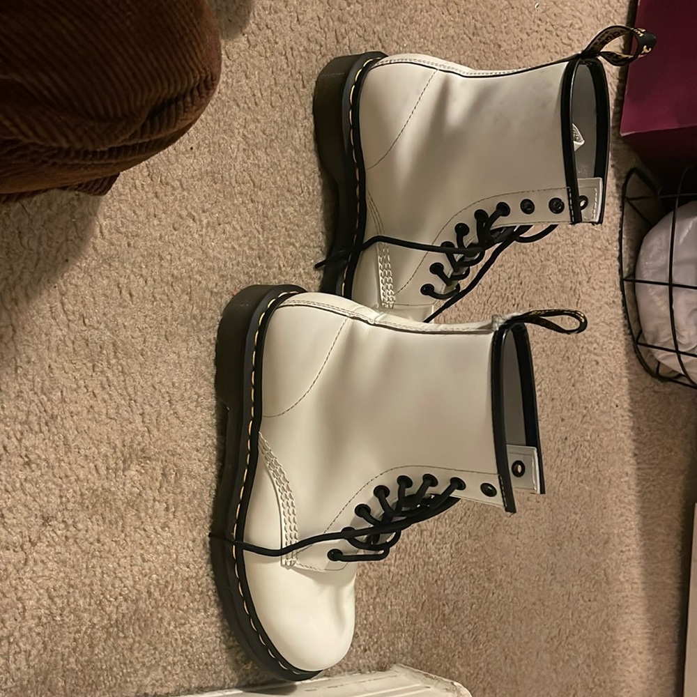 White leather Dr. Martens like new little wear. There are a few faint black dots